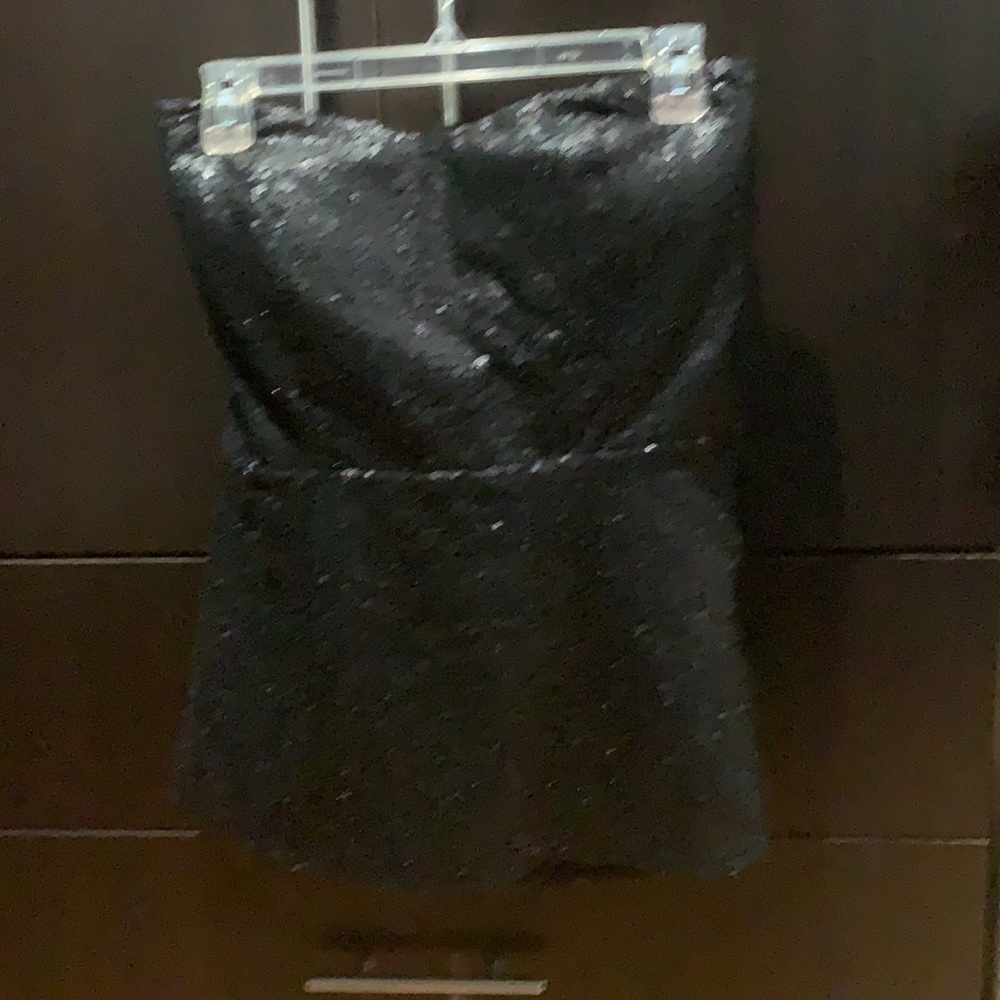 A black sequins corset.